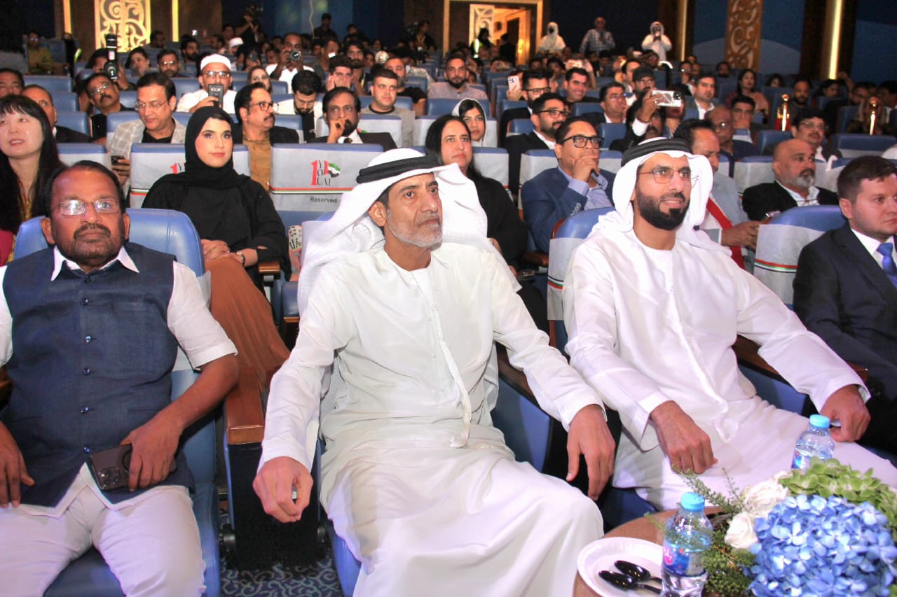 Guests sharing a professional recognition moment in Dubai